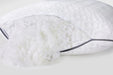 Adjustable pillow with plush hypoallergenic fill gently spilling from open zipper