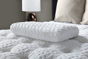 Aireloom Nimbus Visco pillow on a bed in a contemporary bedroom setting