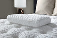 Aireloom Nimbus Visco pillow on a bed in a contemporary bedroom setting