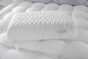 Aireloom Nimbus Visco pillow resting on a plush white mattress