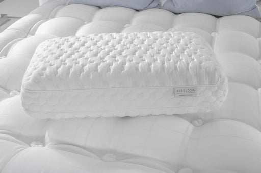 Aireloom Nimbus Visco pillow resting on a plush white mattress