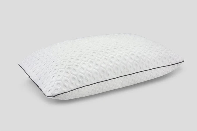 Luxury pillow with textured, breathable cover and seamless piping, fully fluffed